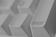 Graphics of keyboard with "Enter" key highlighted